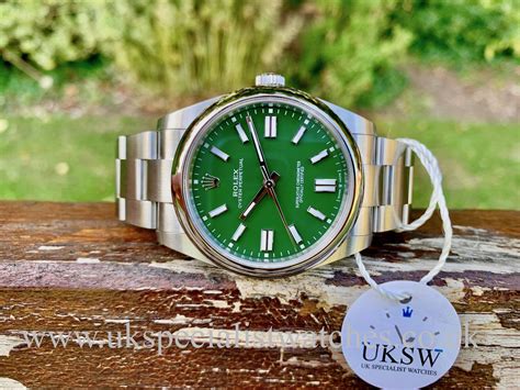 rolex oyster perpetual green dial.